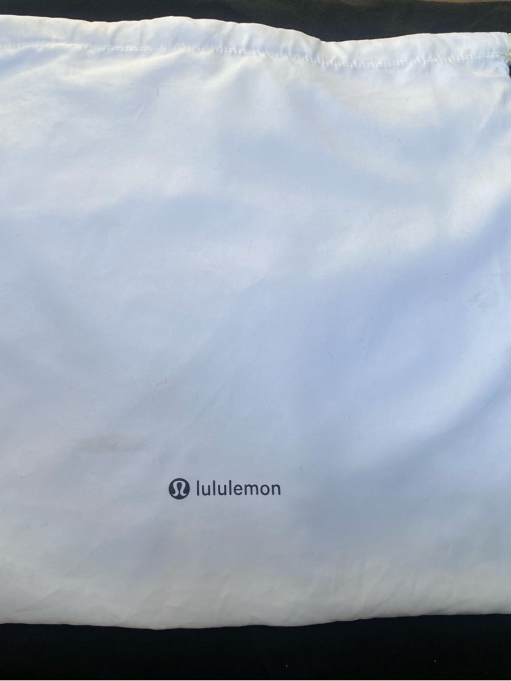 Lululemon white dust bag